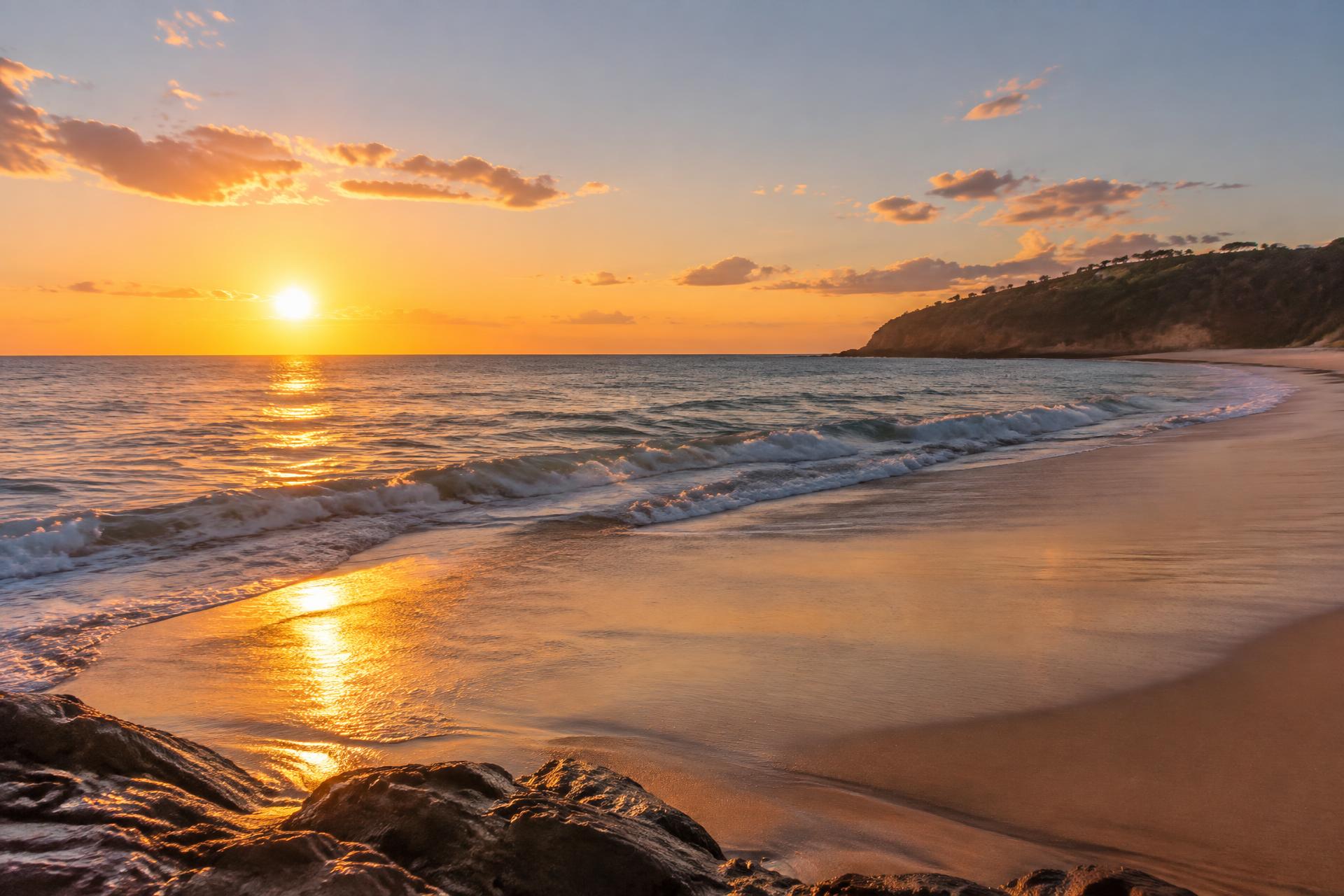 Sunrise over an open Australian coastline