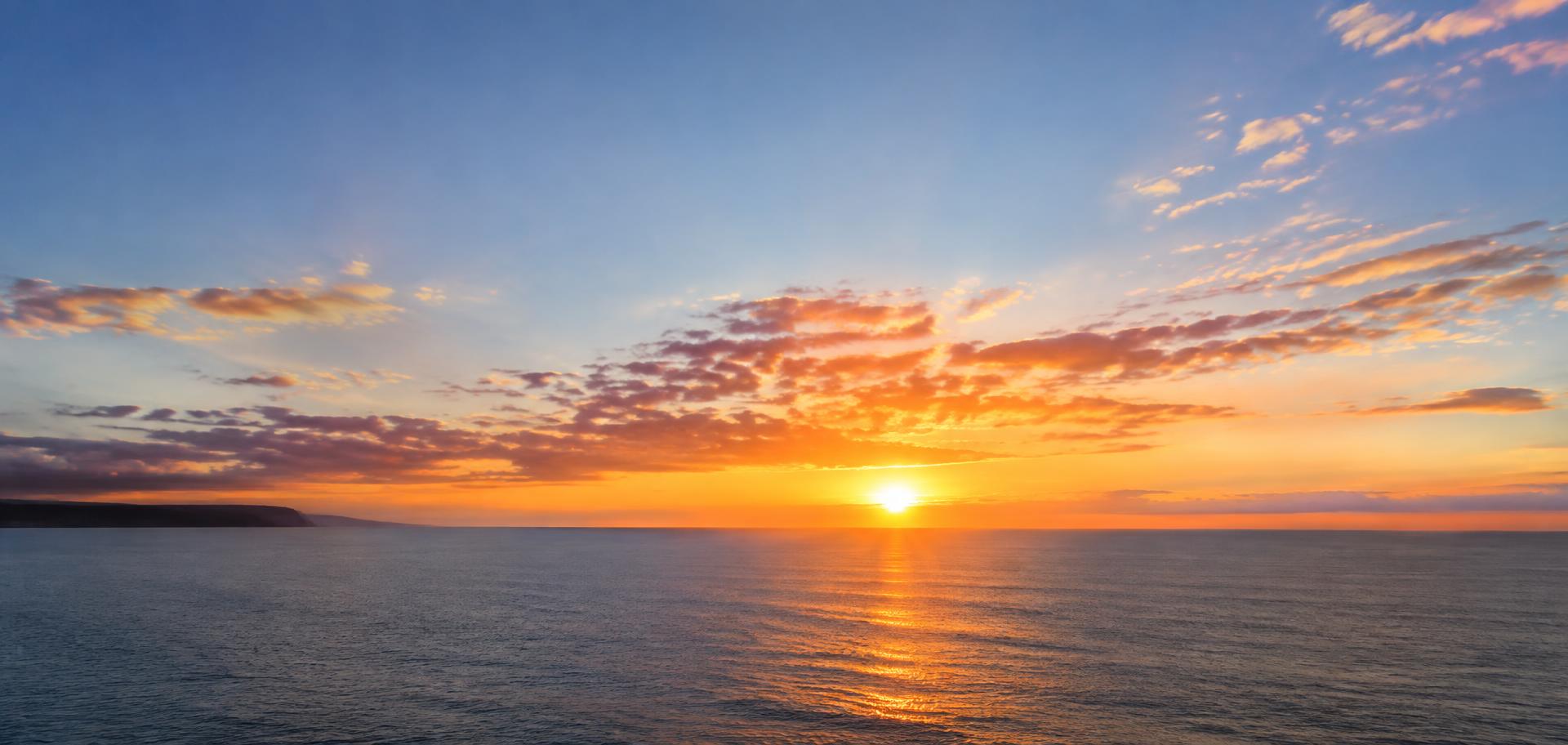 Ocean horizon in hopeful morning light